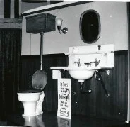 Vintage Deacon Plumbing toilet and sink showroom display